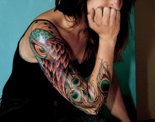 Girls colorful peacock sleeve tattoo