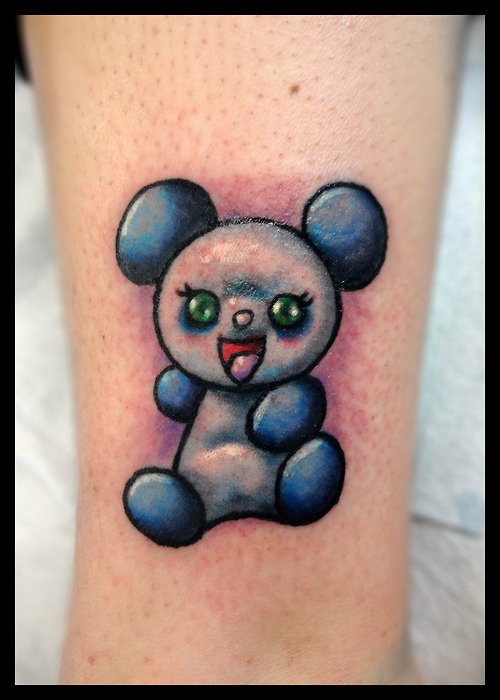 Cute and colorful laughing baby panda tattoo