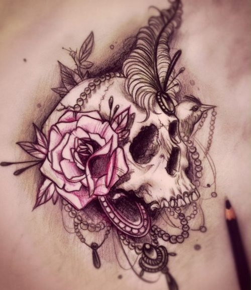 Skull design with old school head dress of flowers, feathers, and jewlery