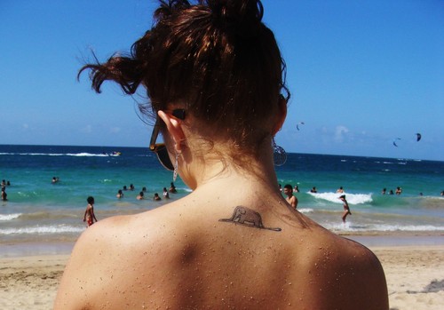 small elephant tattoo on girls back