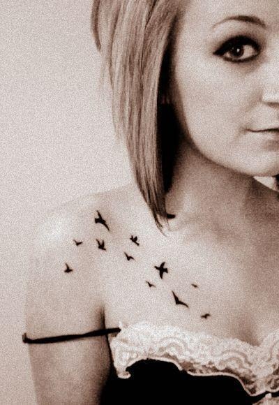 Small black birds tattoo on girls shoulder