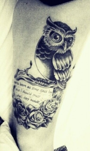 Owl tattoo with quote and roses on girls leg