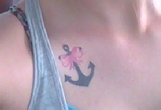 Cute Anchor Tattoo with Pink Bow on Girls Shoulder