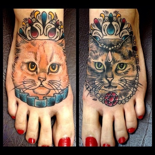 Girls cat tattoo on her feet