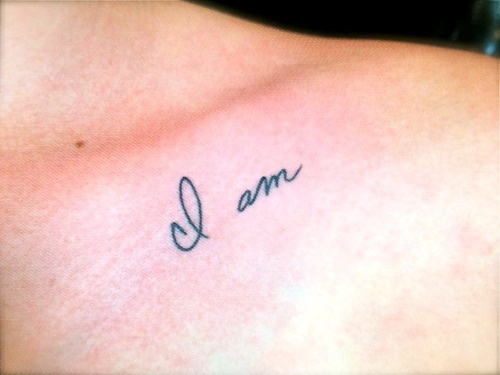 a simple “I am” on girls collarbone