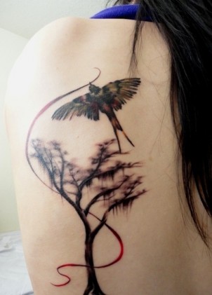 gorgeous tree and bird on girls back