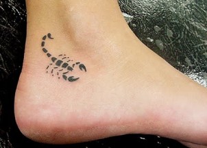Tiny black scorpio ankle tattoo