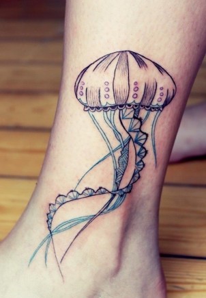Cool jellyfish tattoo on girls ankle